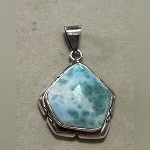 Sterling silver pendant with beautiful stone.